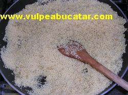 Stirred couscous with the sautéed onion